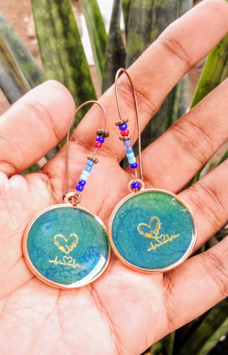 Beautiful Earrings Made Of The Resing Art